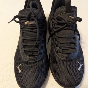 Puma Black Sneakers with Gold Accent Logos